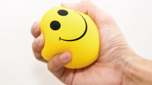 Hand,Squeeze,Yellow,Stress,Ball,,On,White,Background,,Anger,Management,